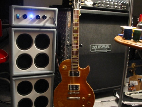 8 x 4" automotive speakers, 2 watt audio amp, mdf enclosure with vinyl from Fanny's Fabrics, looks way cooler than it ever sounded  *smile*