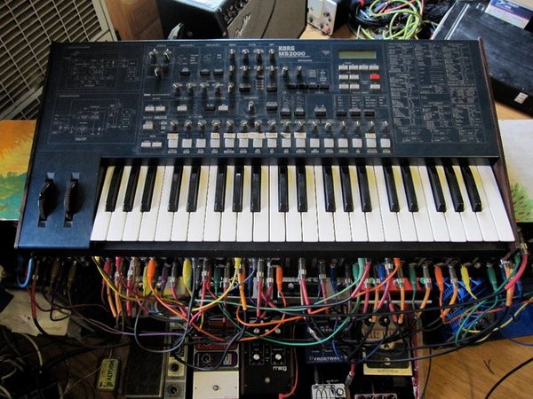 Korg MS2000 atop Synthesizers.com and Mothership pedal board.Psychedelic chaos machine.